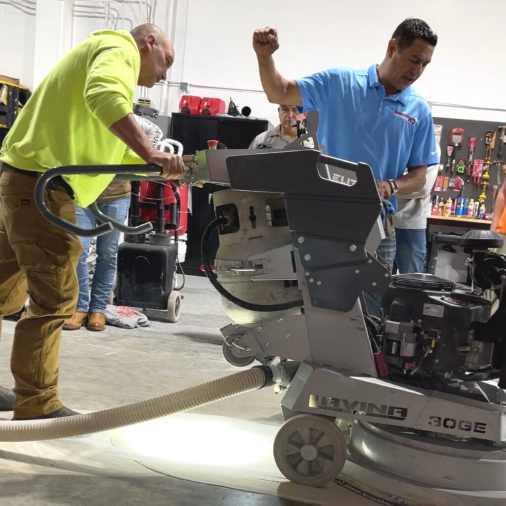 A man is working on a machine in the shop.