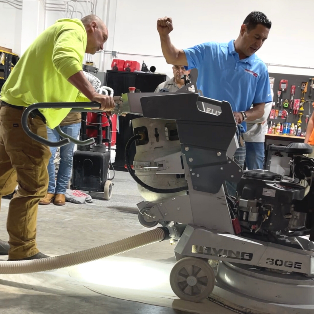 A man is working on a machine in the shop.