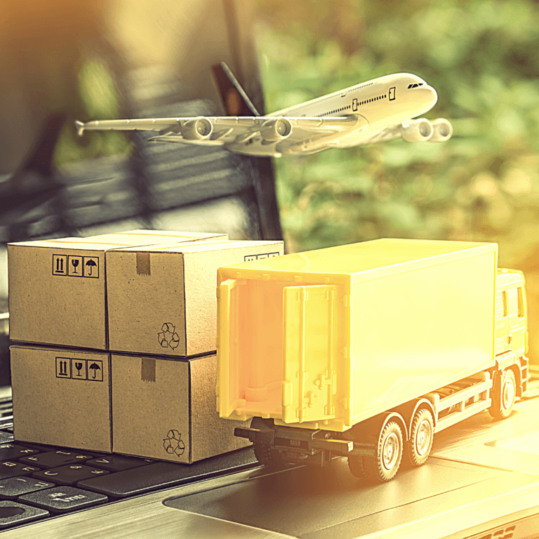 A truck and airplane are on the laptop.